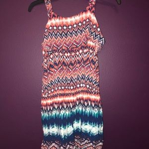 Romper with ruffle in front.